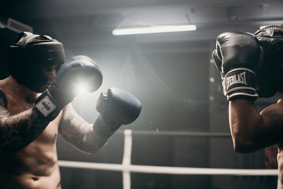 Two men boxing representing the will to win