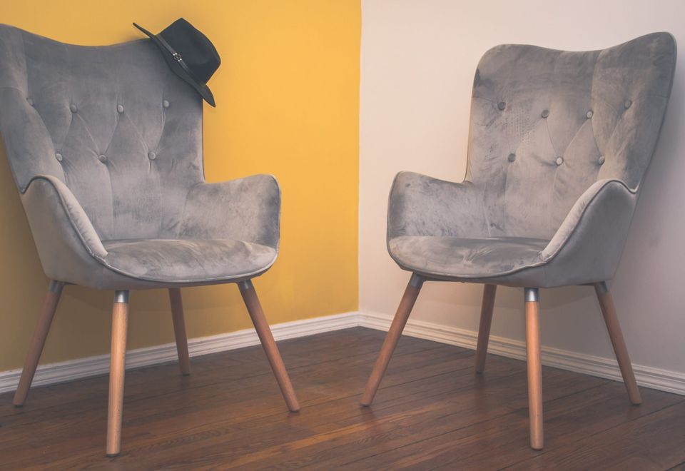 Two opposing chairs representing the empty chair technique