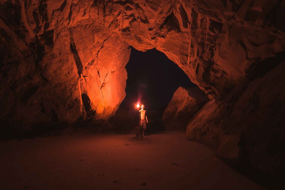 Man in a cave representing echo chambers