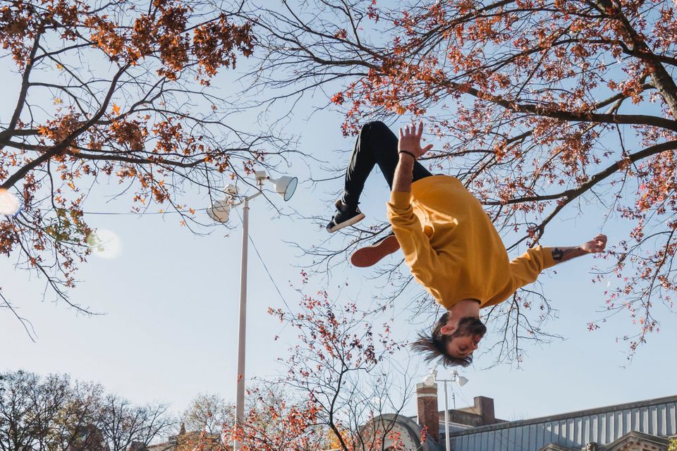 Man doing a backflip conquering fear